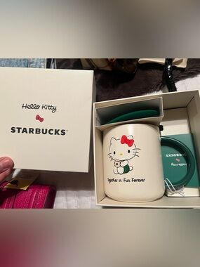 Starbucks Hello Kitty Mug with Red Bow and Green Accent